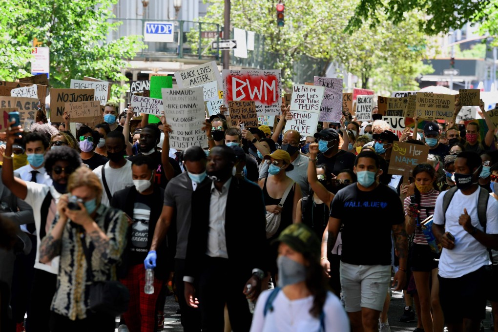 Protesters march on Fifth Avenue in New York on June 12 to protest against police brutality and racial inequality in the aftermath of the death of George Floyd. Photo: AFP