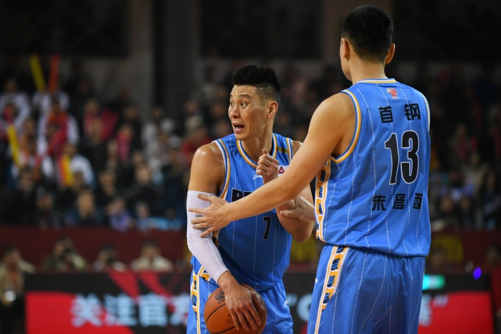 Jeremy Lin (left) of the Beijing Ducks in action during a CBA match against Northeast Tigers in Changchun. Photo: Xinhua