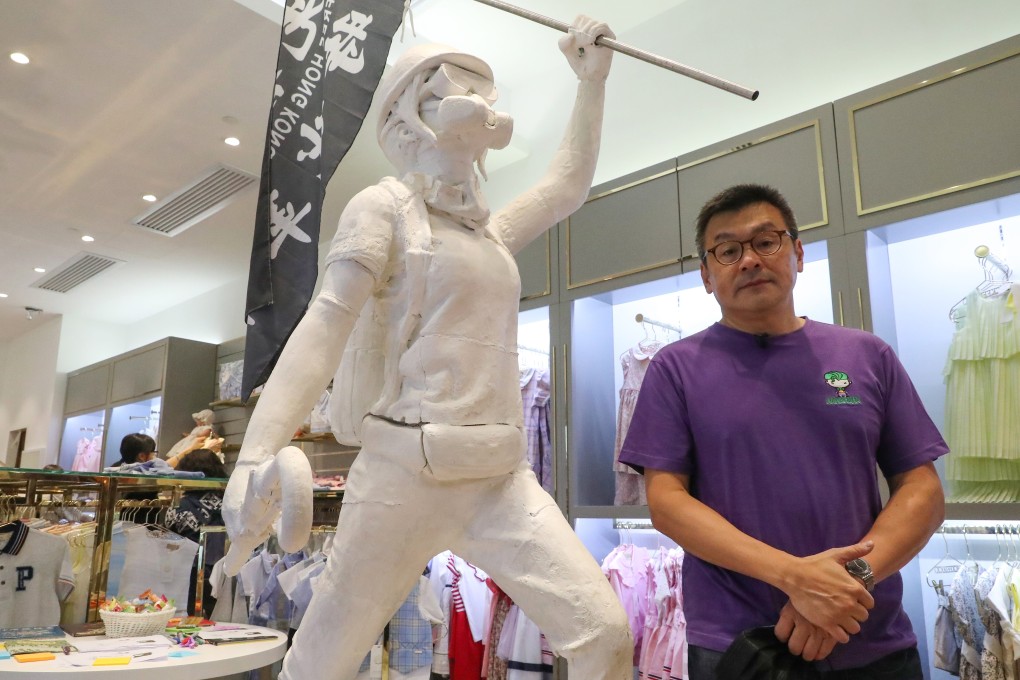 Chickeeduck founder Herbert Chow says he does not plan to remove a statue honouring anti-government protesters from his Tseun Wan location. Photo: Edmond So