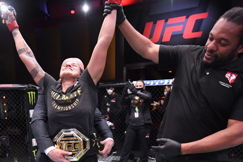 Herb Dean raises Amanda Nunes’s arm as she celebrates after her unanimous decision victory over Felicia Spencer at UFC 250. Photo: USA TODAY Sports