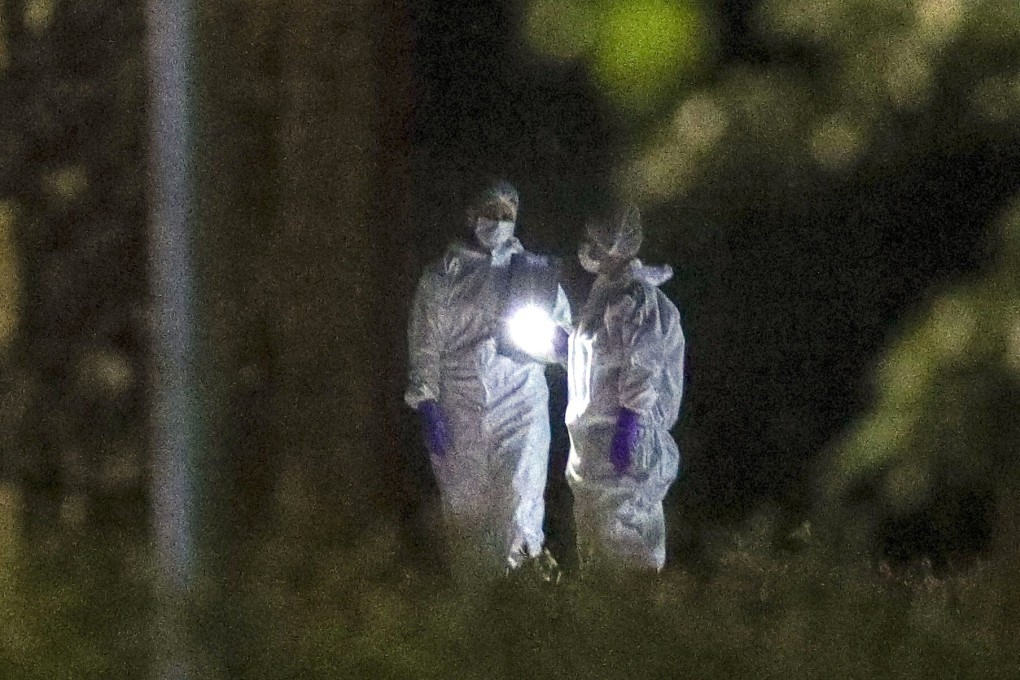 Forensic police at the scene of the stabbing in Reading, England. Photo: AP