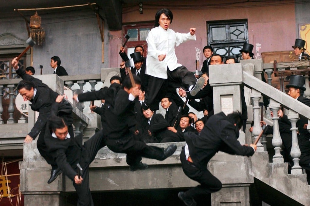 Stephen Chow (in white shirt) in a still from Kung Fu Hustle, the 2004 film that made him an international star. He also wrote and directed the film, a blend of cartoons, wuxia, CGI, and action.