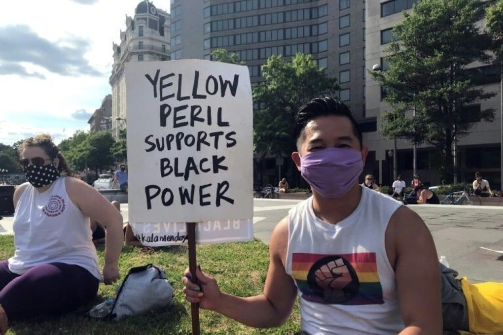 Viet Hoai Tran supporting a Black Lives Matter protest in Washington. Photo: AFP