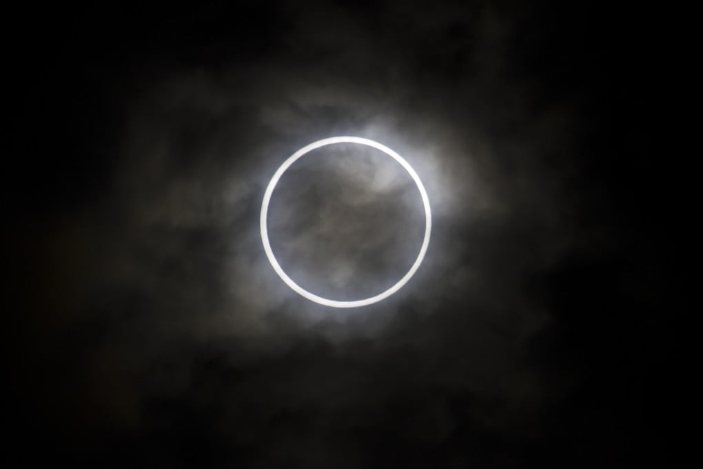 A full “ring of fire” annular eclipse seen through thin clouds from Tokyo on the morning of May 21, 2012. Photo: Getty Images