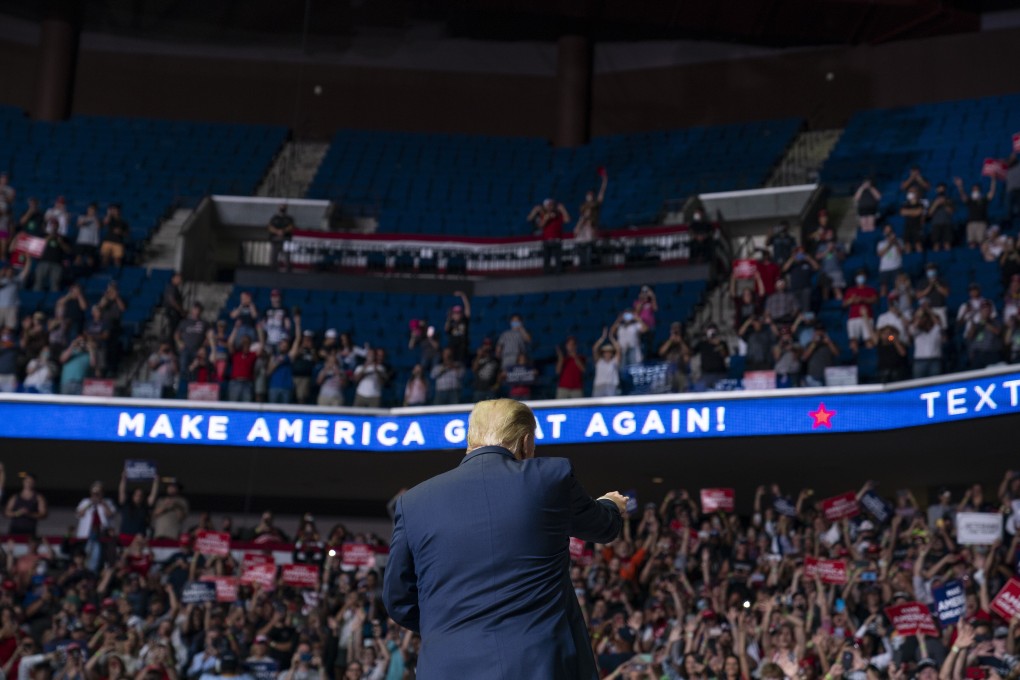 US President Donald Trump arrives on stage to speak at his campaign rally in Tulsa, Oklahoma. Photo: AP