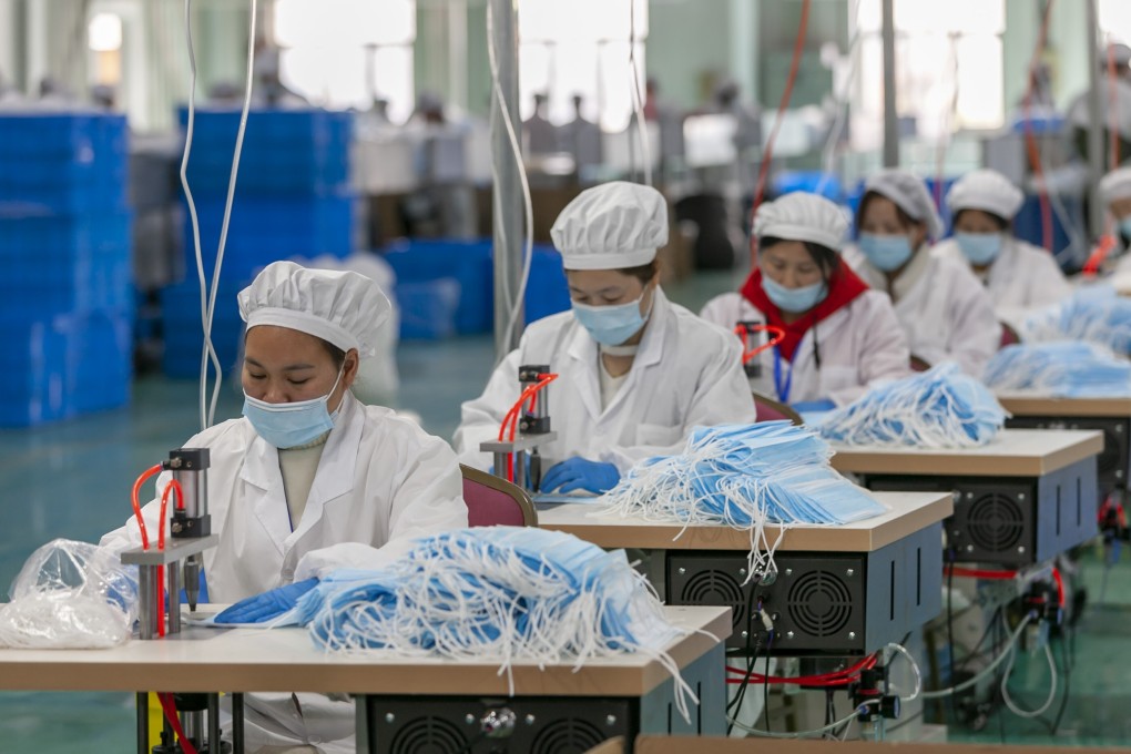 Workers make protective masks at a mask plant of Chinese underwear brand Threegun Group in Shanghai in April. Photo: Xinhua
