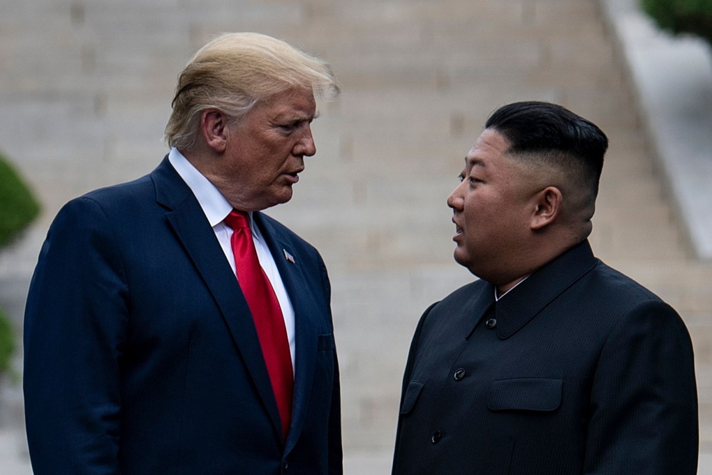 US President Donald Trump and Kim Jong-un stand on the North Korean side of the demilitarised zone in Panmunjom. Photo: AFP