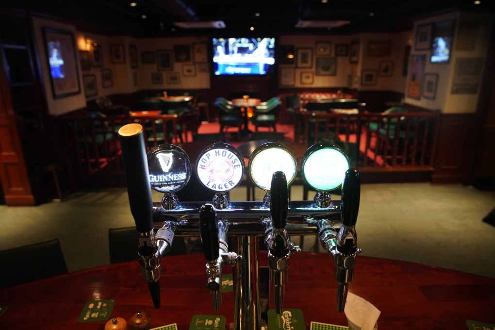 An empty Delaney’s bar in Wan Chai, Hong Kong. Venues in Hong Kong’s two traditional nightlife hubs have suffered after year-long anti-government protests and the more recent Covid-19 epidemic. Photo: Winson Wong