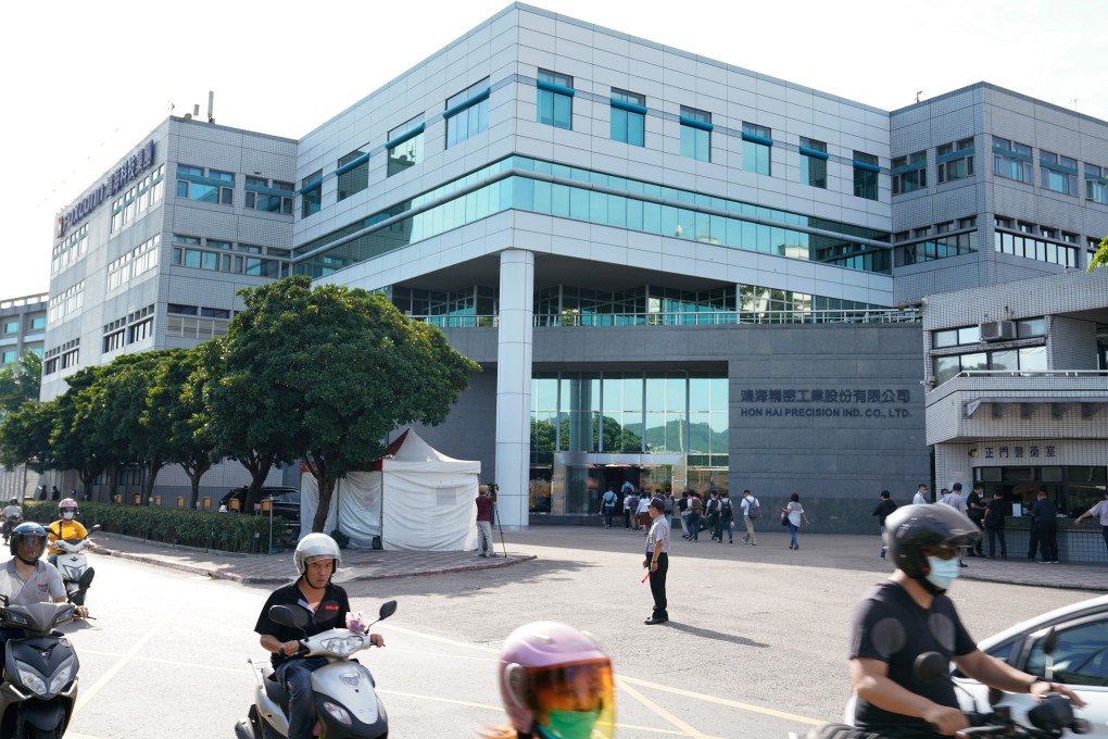 People enter the headquarters of Hon Hai Precision Industry ahead of the company's annual general meeting in New Taipei City, Taiwan, on June 23. Photo: Bloomberg