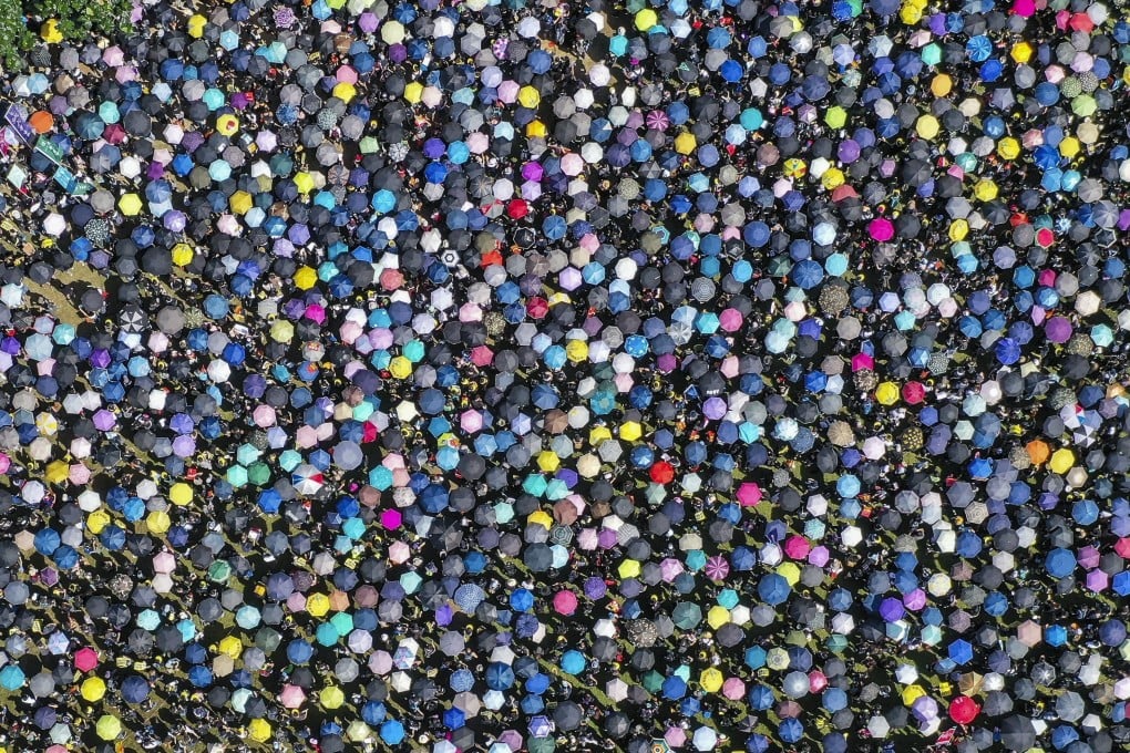 Protesters march from Victoria Park in Causeway Bay to government offices in Tamar, on July 1, last year. Photo: Martin Chan