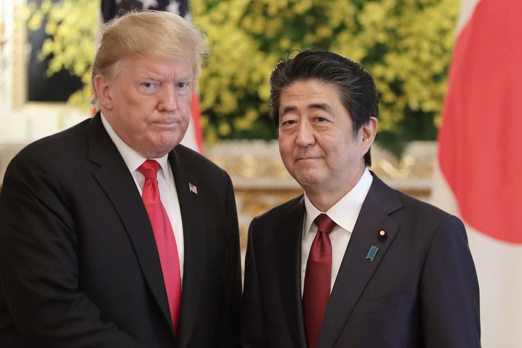 US President Donald Trump and Japanese Prime Minister Shinzo Abe pose for a photo before a meeting in Tokyo in May 2019. John Bolton wrote that the two leaders had a good personal relationship, both as “golf buddies as well as colleagues”. Photo: AP