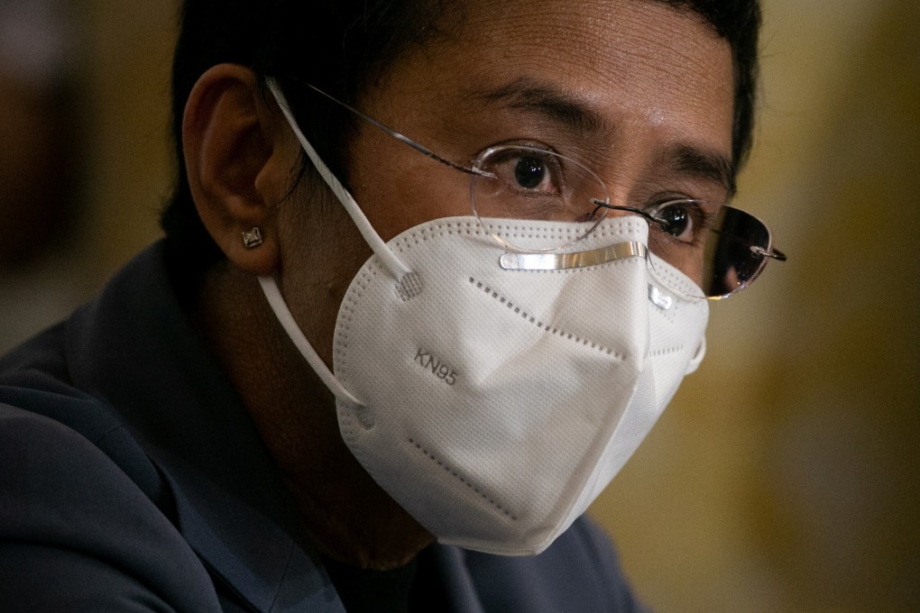 Maria Ressa, executive editor and CEO of Philippine news website Rappler, speaks to the media after being found guilty of cyber libel in Manila on Monday. Photo: Reuters