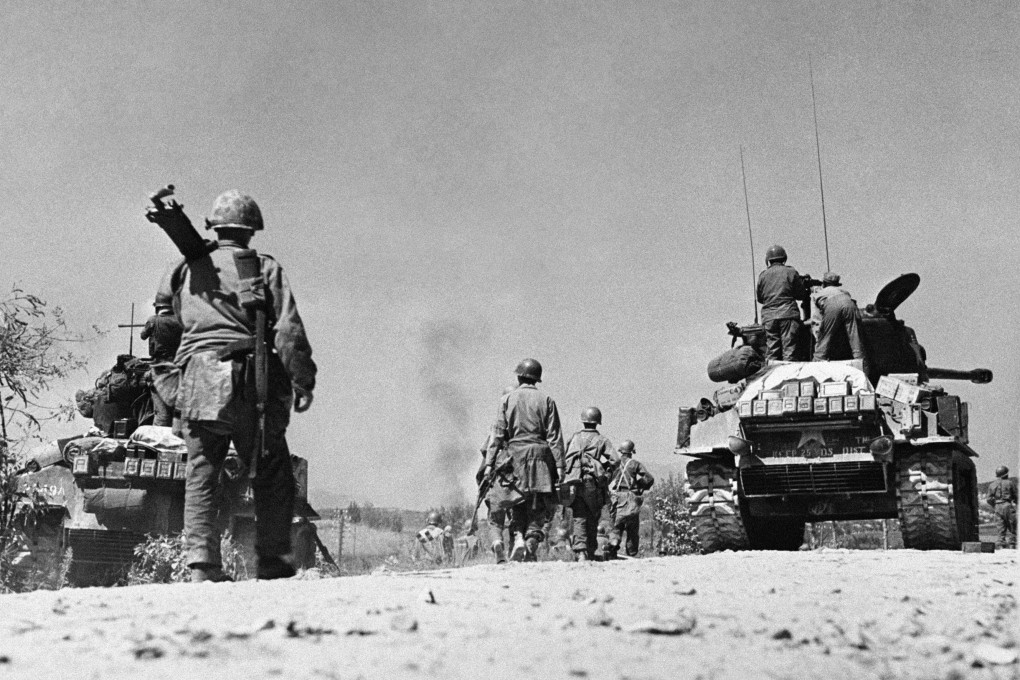 US and South Korean soldiers head towards Pyongyang, where they occupied the North Korean capital on October 20, 1950. File photo: AFP