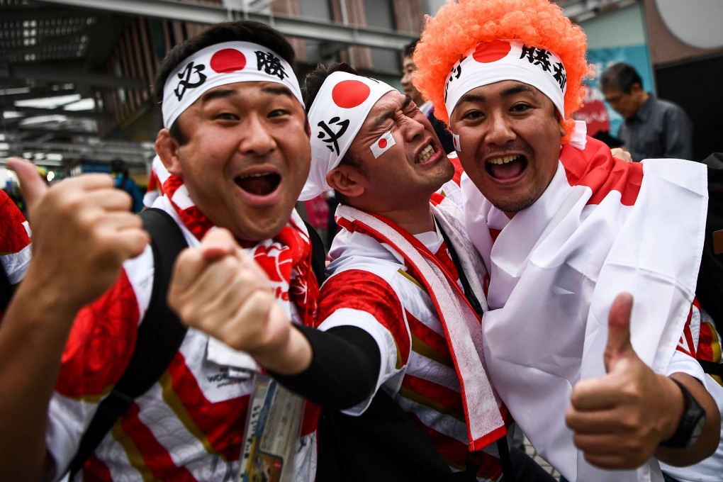 Japanese fans cheer for the home team before the 2019 Rugby World Cup quarter-final against South Africa. Photo: AFP