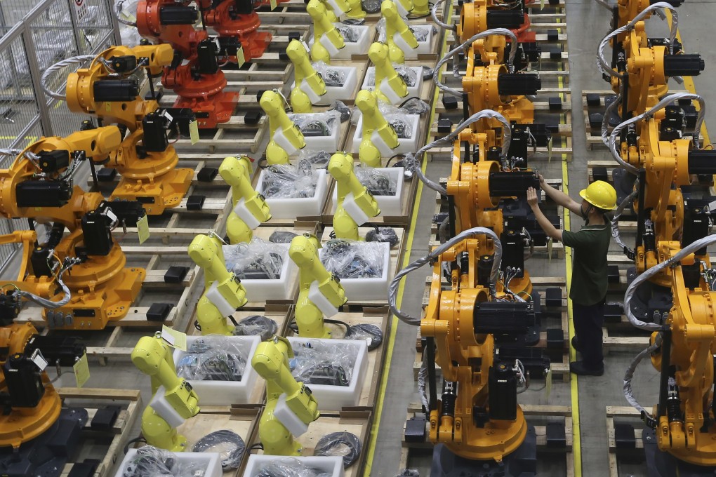 A worker checks on robot arms at a factory in Nanjing in east China’s Jiangsu province in June 2019. Both Chinese and British firms do not perform adequate due diligence. Photo: AP