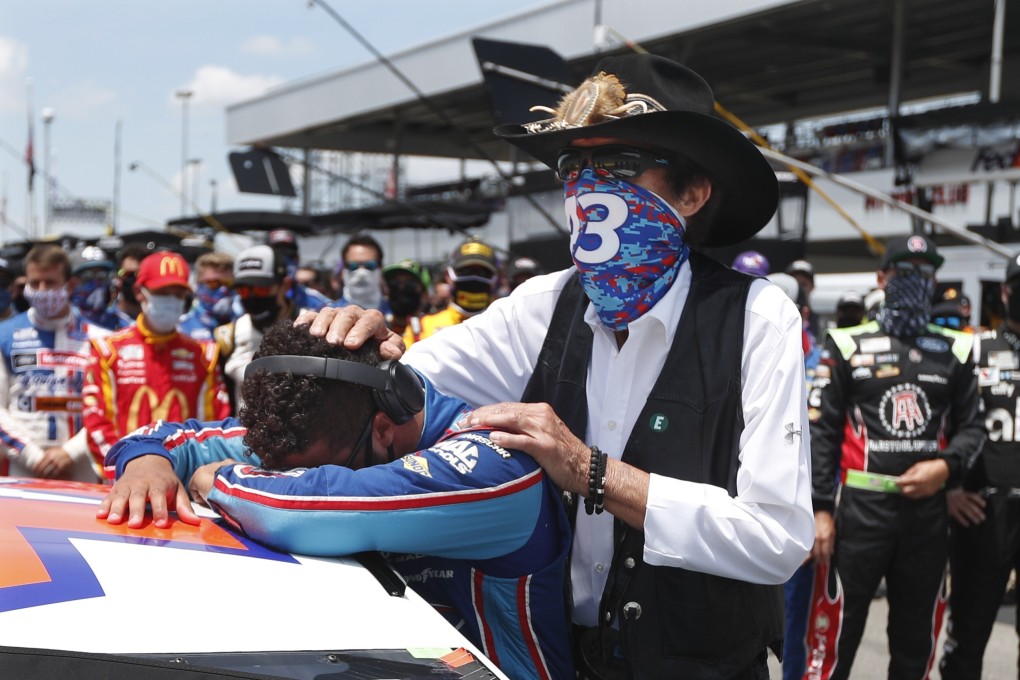 Nascar driver Bubba Wallace is consoled by team owner Richard Petty. Photo: AP