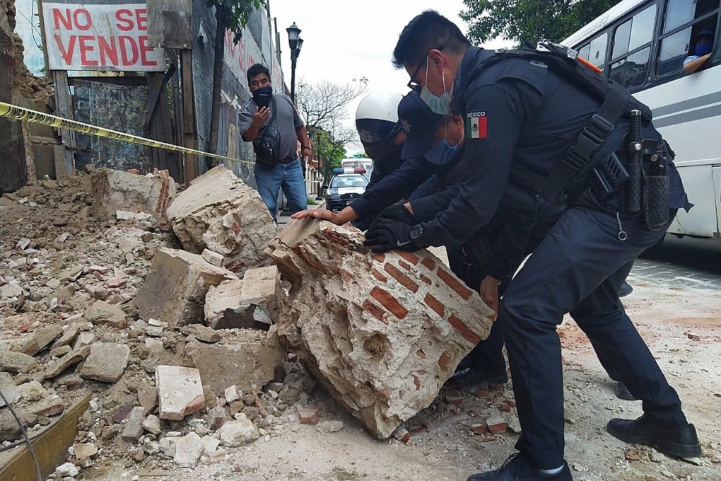 Debris is cleared after an earthquake in Oaxaca, Mexico on Tuesday. Photo: EPA-EFE