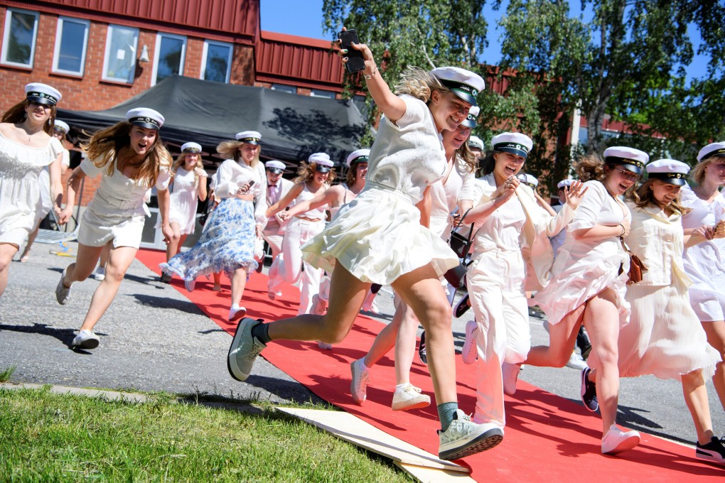 Students celebrate their high school graduation in Stockholm, Sweden, on June 3. Schools have never been closed in Sweden amid the pandemic. Photo: Reuters