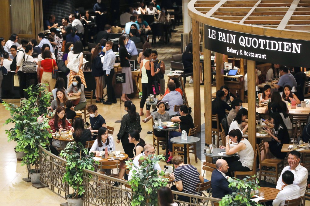 A restaurant at Pacific Place in Admiralty was full of people having lunch on June 18, reflecting eased social distancing rules. Photo: May Tse