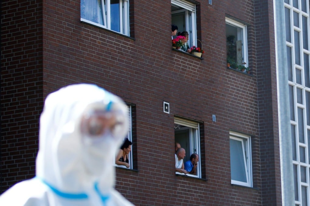 Employees of the Toennies factory, who are under lockdown in Verl, Germany after a coronavirus outbreak in the meatpacking plant. Photo: Reuters