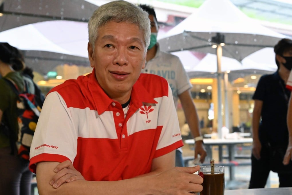 Lee Hsien Yang, the brother of Singapore's Prime Minister Lee Hsien Loong, is pictured after being presented with his membership card for the opposition Progress Singapore Party at the Tiong Bahru Market on June 24. Photo: AFP