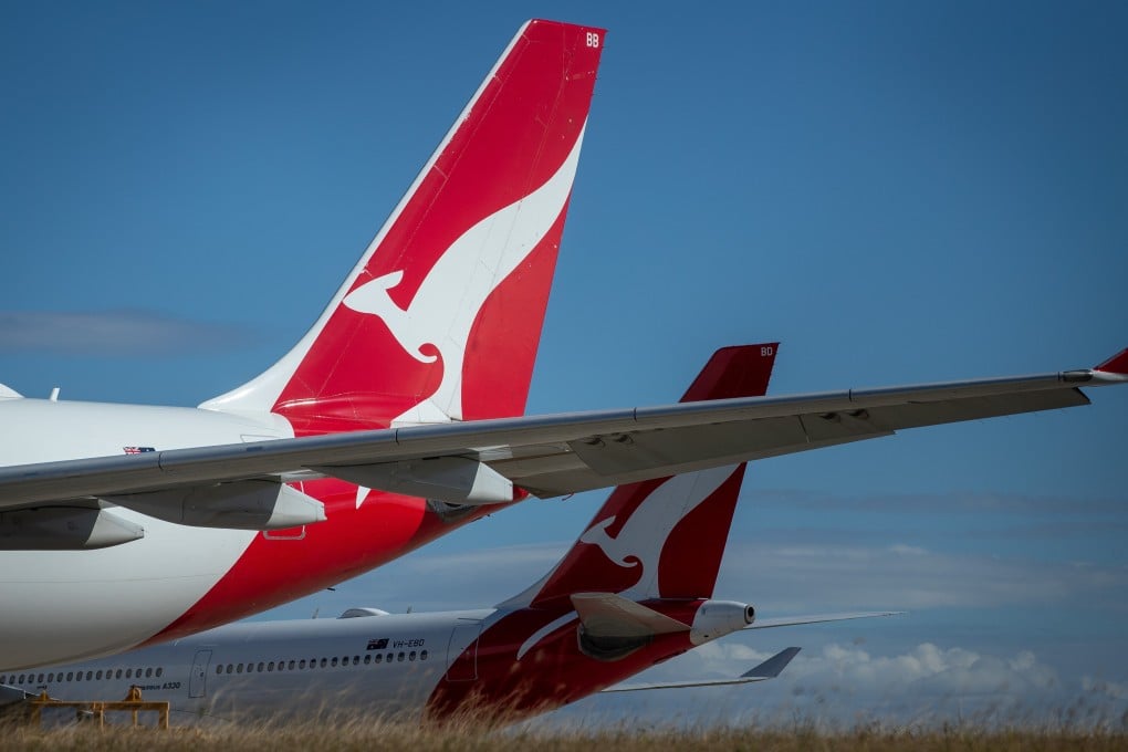 Qantas Airways planes are seen grounded at Brisbane Airport. The Covid-19 pandemic has forced the Australian airline to cancel nearly all its international flights until at least October and slash domestic routes. Photo: Bloomberg