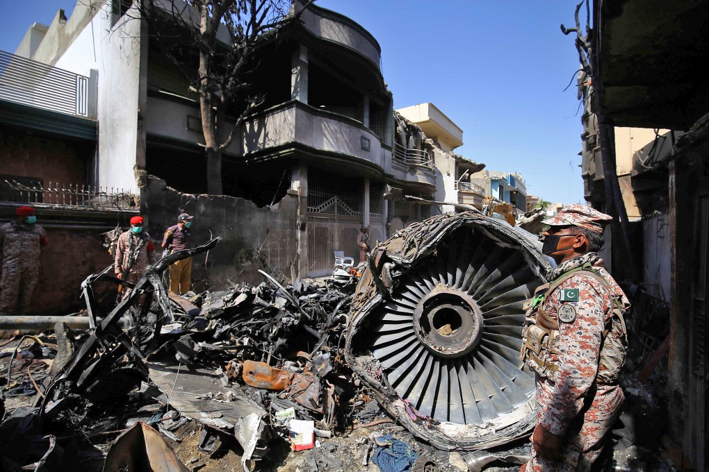 The wreckage of a state-run Pakistan International Airlines aircraft at the scene of a crash on May 22. Photo: EPA