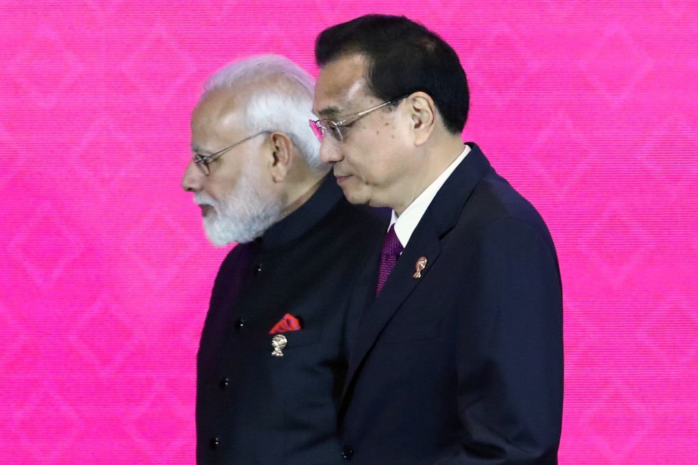Indian Prime Minister Narendra Modi and Chinese Premier Li Keqiang attend the Regional Comprehensive Economic Partnership summit in Bangkok last year. Photo: Reuters