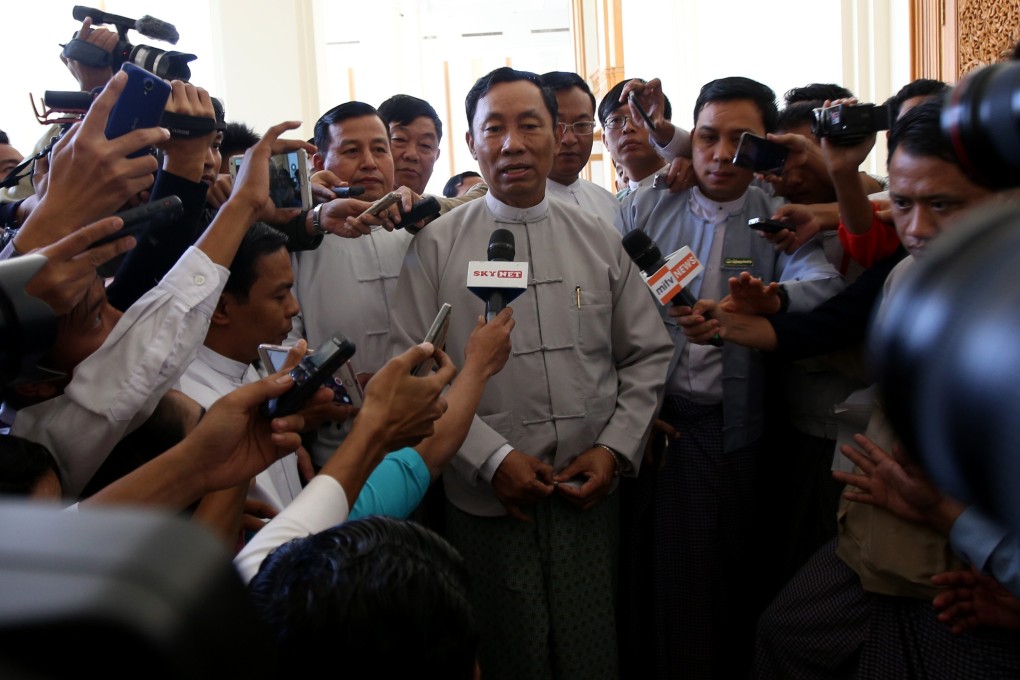 Shwe Mann speaks to media outside the first session of the new parliament in 2016. Photo: Xinhua