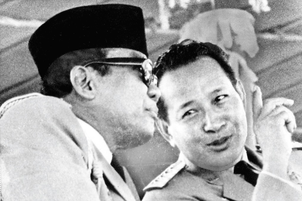 Indonesian president Sukarno (left), who handed over his presidential power to military strongman Suharto in February 1967, is shown with Suharto during an Independence Day Parade in Jakarta, in October 1966. Photo: AP