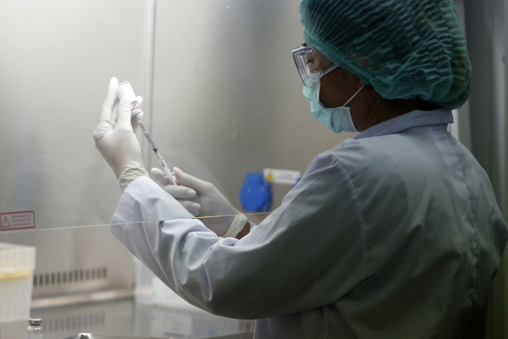 A Thai scientist works on vaccine research at the National Primate Research Centre of Chulalongkorn University. Photo: dpa