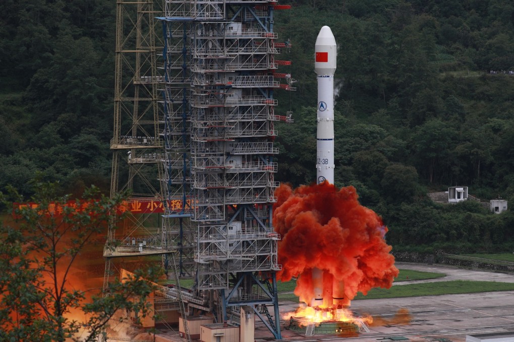 A carrier rocket carrying the last probe for China’s BeiDou satellite navigation system blasts off on Tuesday. Photo: Xinhua