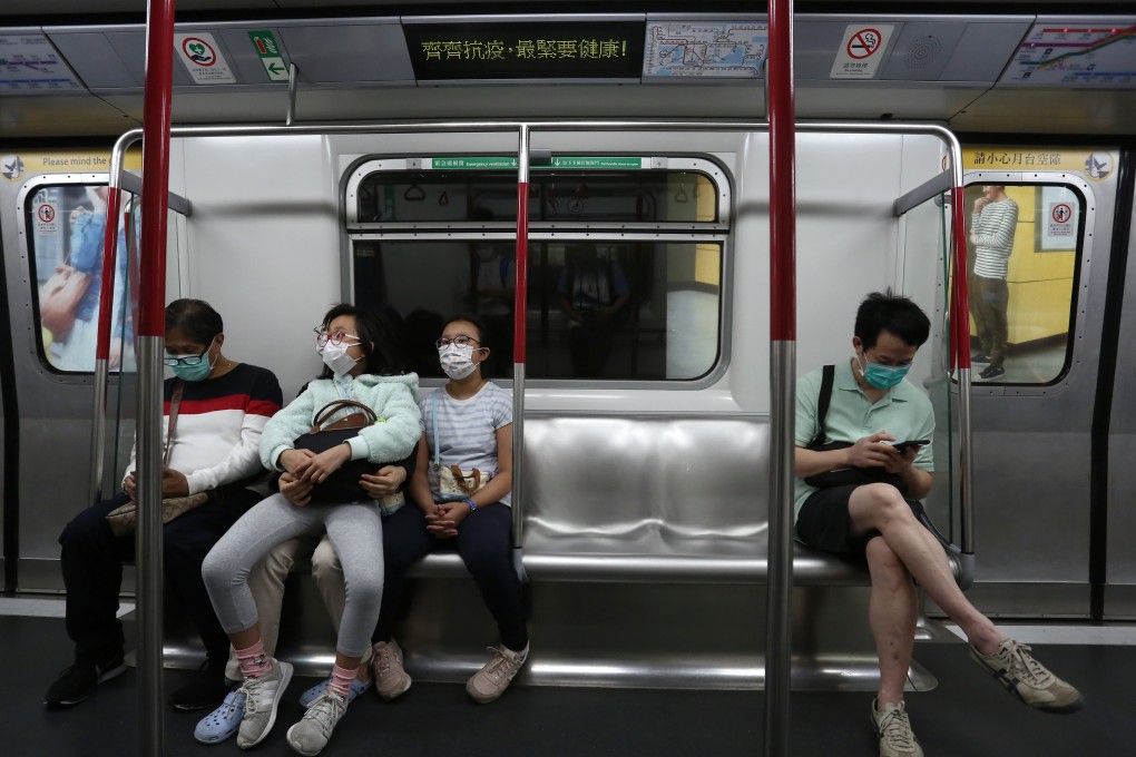 Hong Kong passengers practise social distancing while travelling on the MTR on April 11, in line with measures in place to avoid transmission of the novel coronavirus. Photo: Jonathan Wong