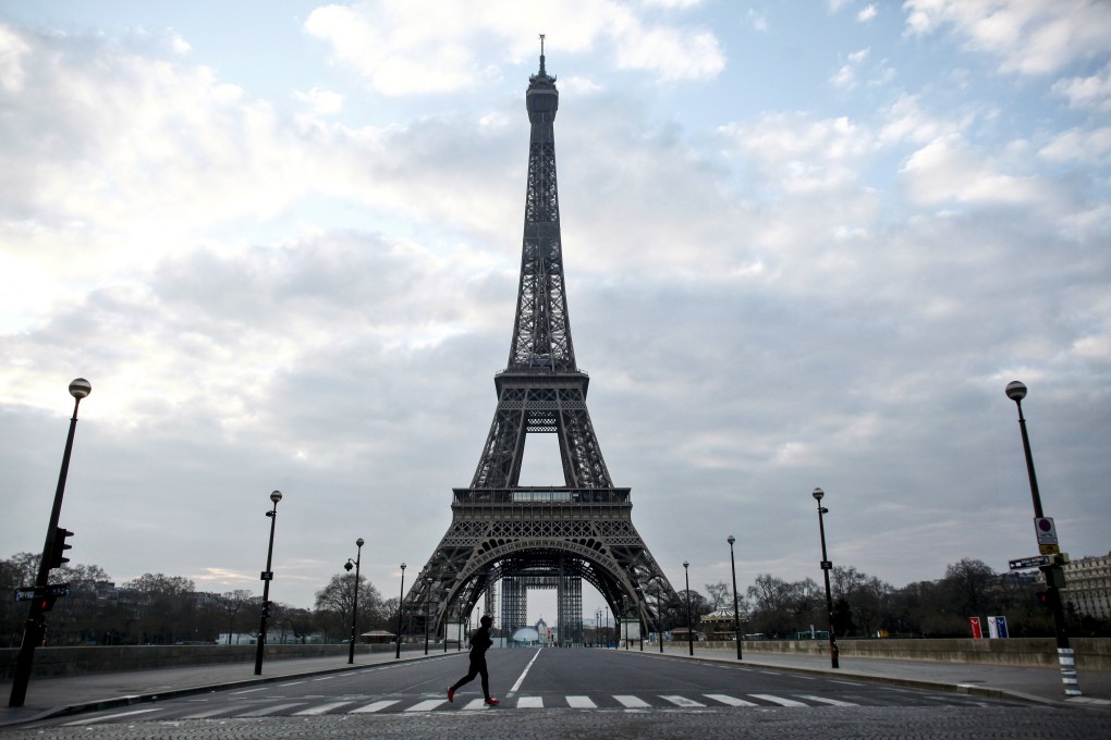 Visitors to the Eiffel Tower this summer who want to get a view of Paris from the top will have to walk up all 674 stairs as the lifts are kept shut to prevent the spread of coronavirus. Photo: AP
