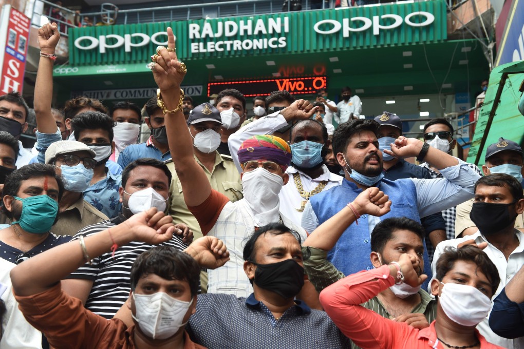 Protesters take part in an anti-China demonstration at a commercial area in Ahmedabad on Wednesday. Photo: AFP