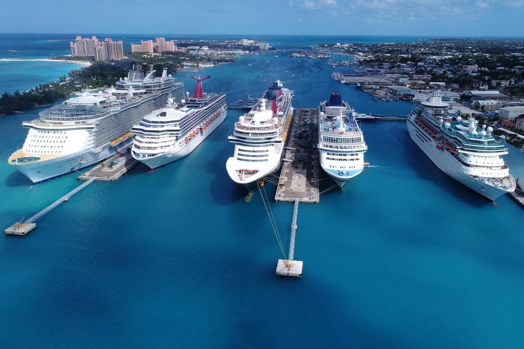 Cruise ships sit at anchor in Nassau, the Bahamas. Operators in the industry aim to rebuild trust with passengers by introducing new health measures like pre-embarkation health screenings and social distancing. Photo: Getty Images/EyeEm