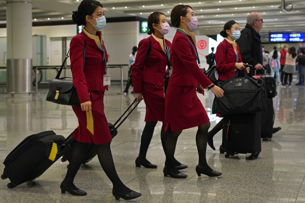 Cathay Pacific flight attendants at Hong Kong’s airport. The aviation industry has been hammered by the Covid-19 pandemic. Photo: AP