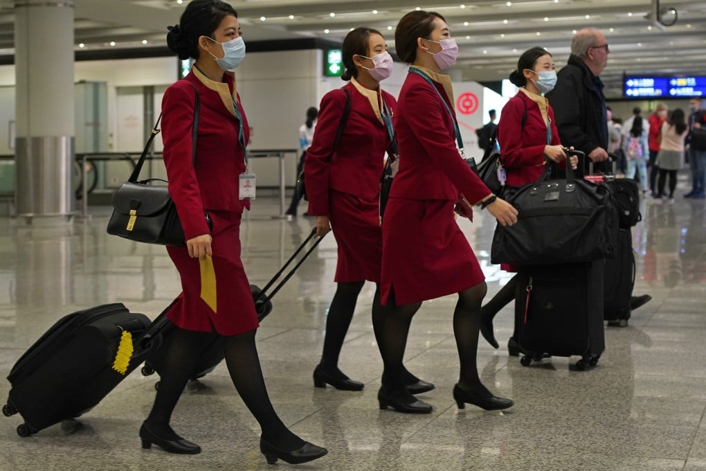 Cathay Pacific flight attendants at Hong Kong’s airport. The aviation industry has been hammered by the Covid-19 pandemic. Photo: AP
