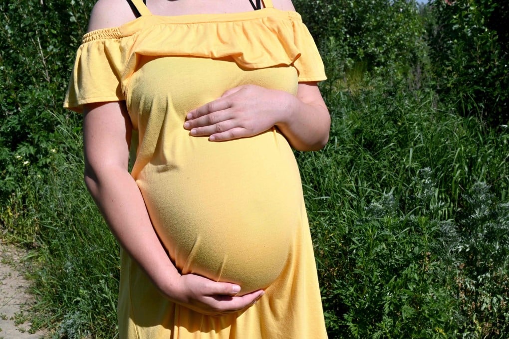 Olga, a 26-year-old going through her second surrogacy and expecting twins for a Chinese couple. Photo: AFP