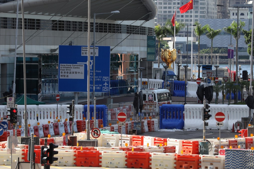 Water barriers have been placed on roads leading towards Golden Bauhinia Square in Wan Chai, where the July 1 flag-raising ceremony marking the handover from Britain will be held. Photo: Dickson Lee