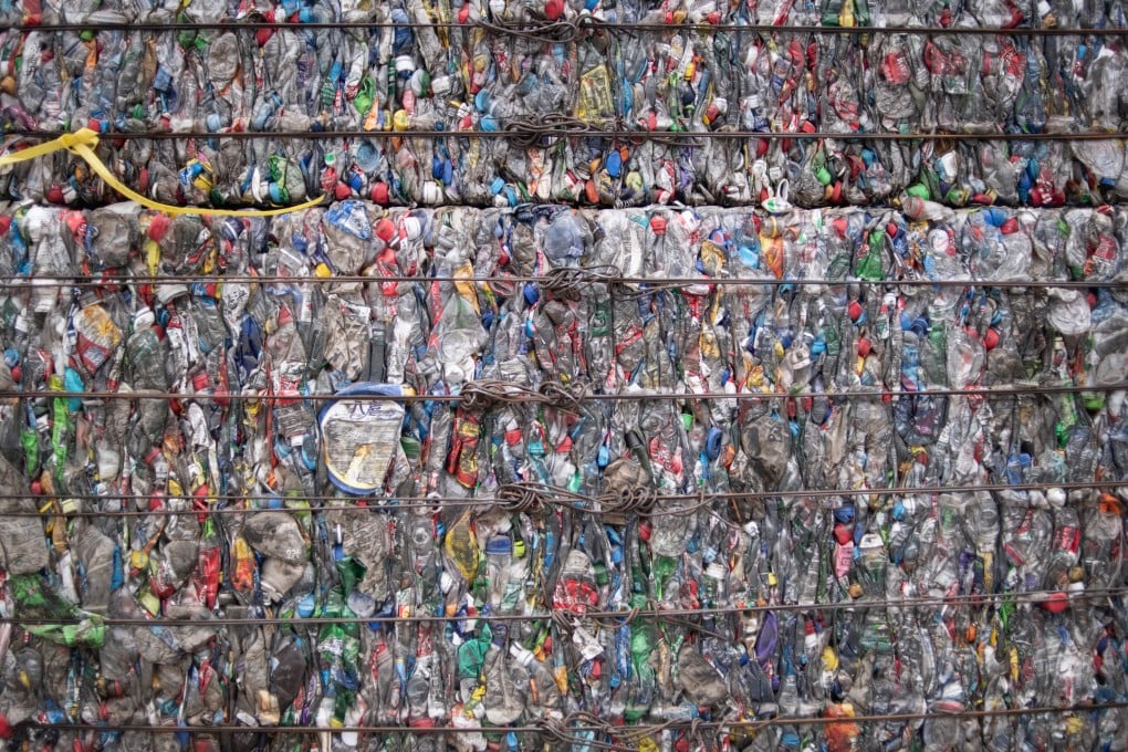 A block of compressed bottles at a plastic waste centre on the outskirts of Beijing in May 2018. China has passed legislation reaffirming its intent to completely ban solid waste imports. Photo: AFP