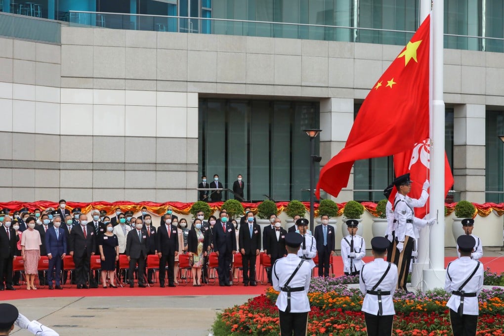 The Chinese flag is raised at Golden Bauhinia Square in Wan Chai to mark the 23rd anniversary of Hong Kong’s return to Chinese rule. Photo: K.Y. Cheng