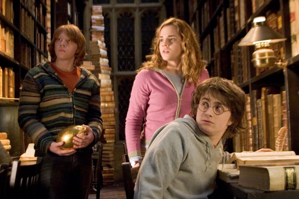 Rupert Grint, Emma Watson and Daniel Radcliffe in a still from Harry Potter and the Goblet of Fire. A long-awaited Harry Potter game is still on track for release next year, insiders say. Photo: AP