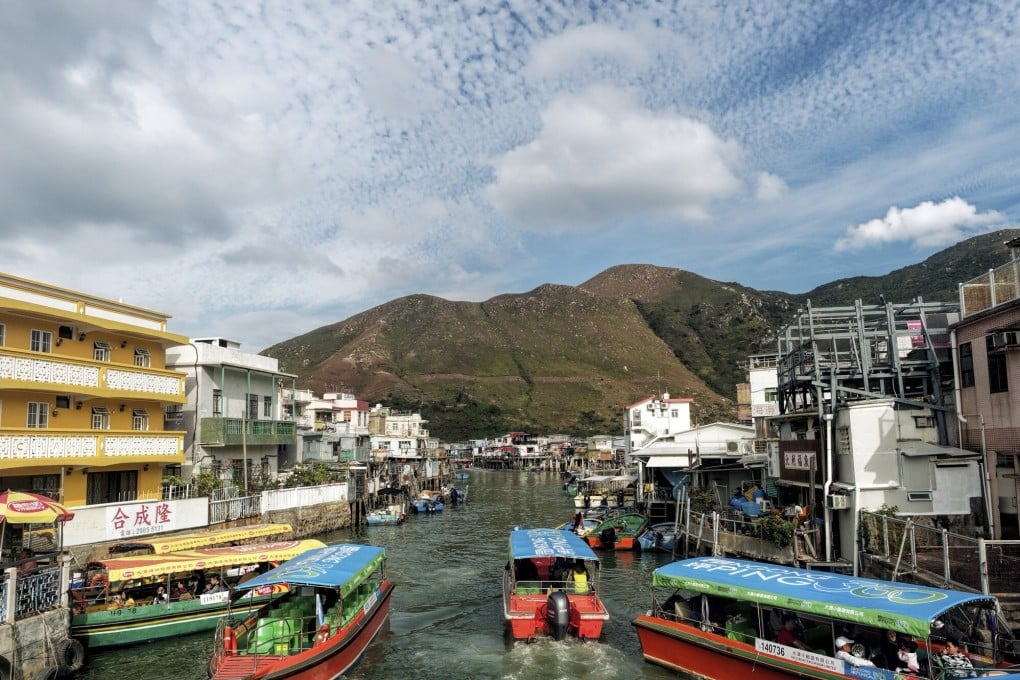 Boats run along Tai O creek, off Hong Kong’s Lantau Island, in January. The Tai O fishing village is famous for its traditional Chinese stilt-house community. Credit: Martin Williams