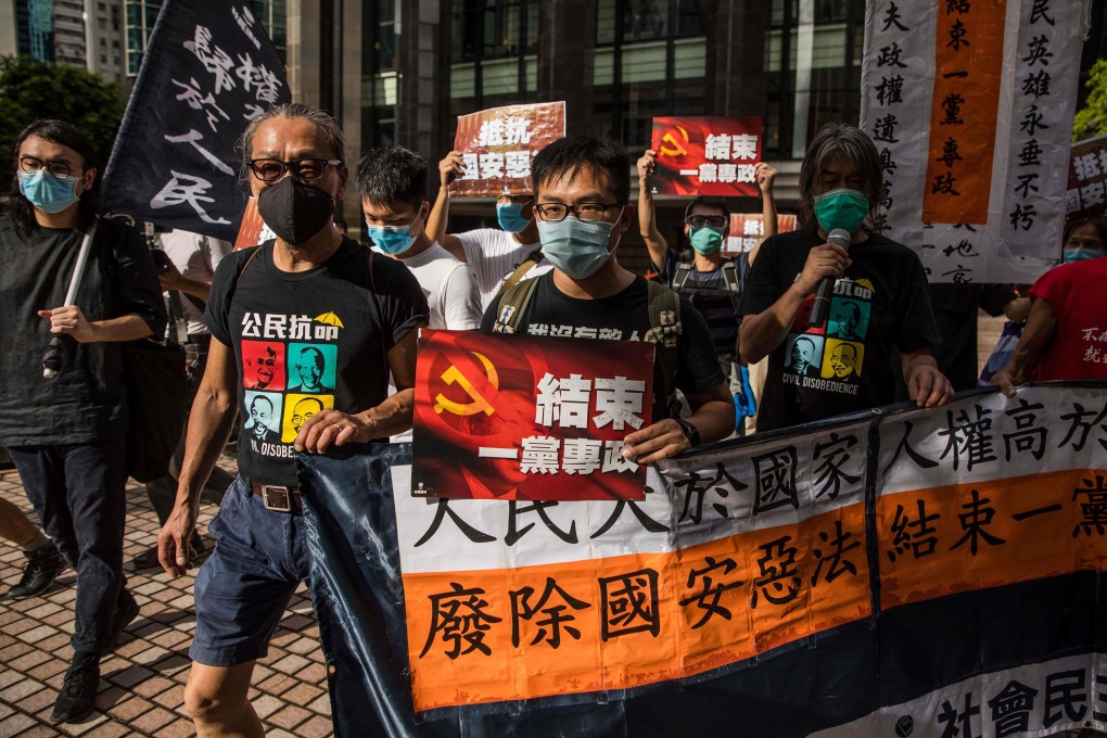 Pro-democracy protesters march during a rally against a new national security law in Hong Kong on Wednesday. Photo: AFP