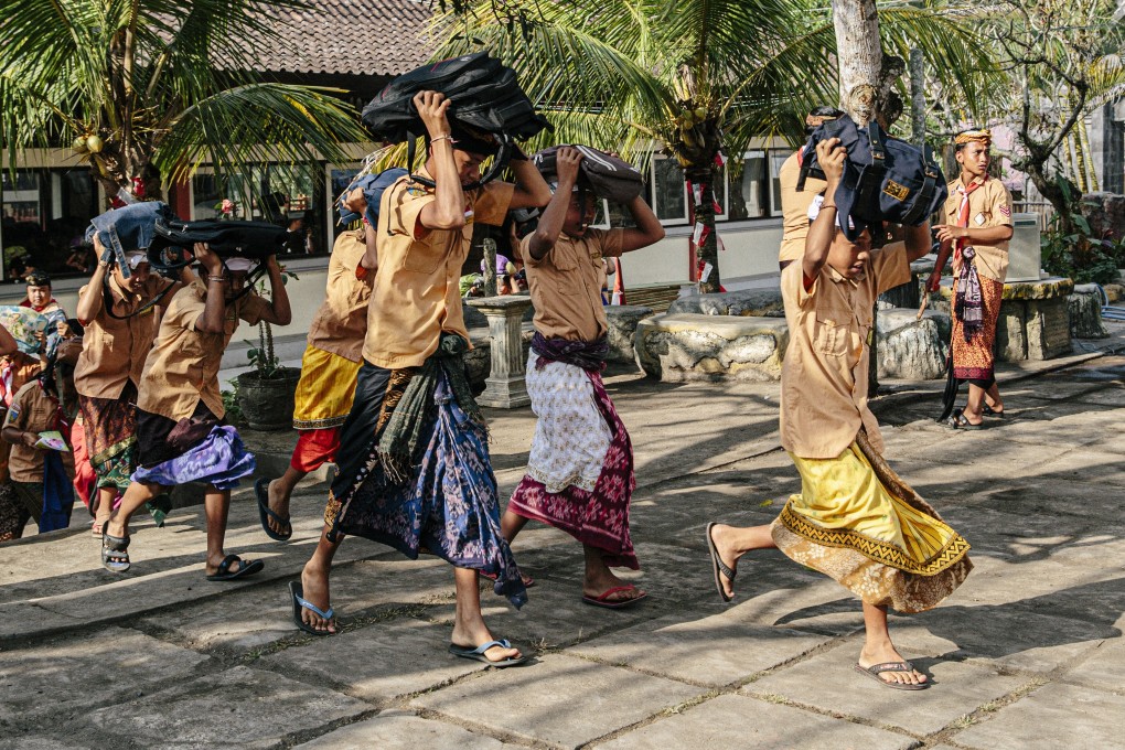 Students practise volcano evacuation drills in Bebandem village, Bali, Indonesia, last August. Photo: Putu Sayoga