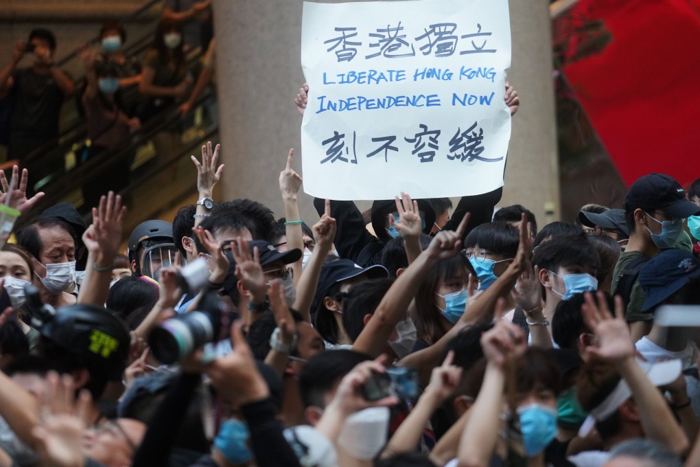Pro-democracy protesters Wednesday outside the Times Square in Causeway Bay, Hong Kong. Photo: Winson Wong