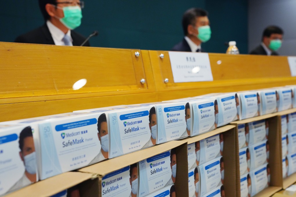 Customs displays the fake masks at a press briefing. Photo: Sam Tsang