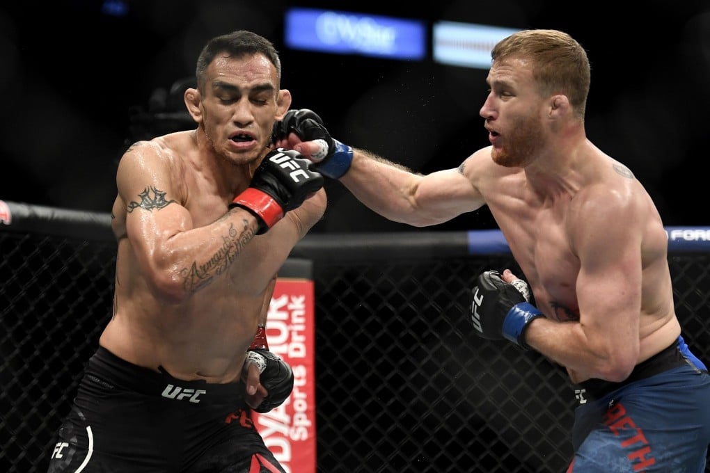Justin Gaethje punches Tony Ferguson in their UFC interim lightweight title fight at UFC 249 in the VyStar Veterans Memorial Arena in Jacksonville, Florida in May. Photo: AFP