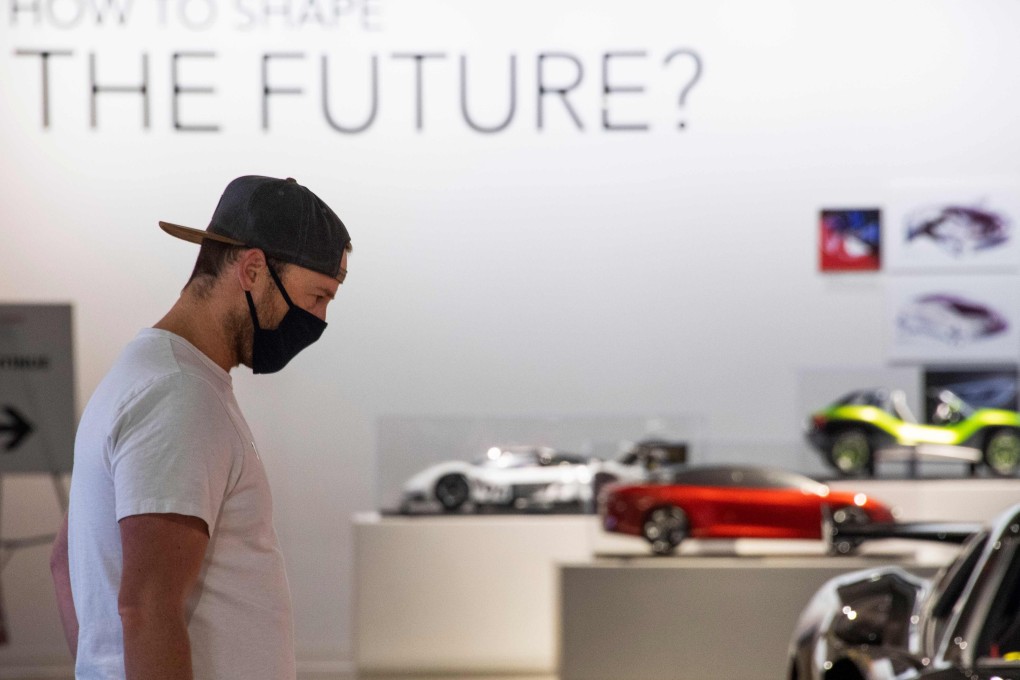 A man wearing a face mask visits the recently reopened Petersen Automotive Museum in Los Angeles, California, on July 1. California governor Gavin Newsom has announced that the state would be shutting down indoor operations for restaurants, zoos, museums and several other sectors effective immediately due to concerns over the recent spike in Covid-19 cases. Photo: AFP